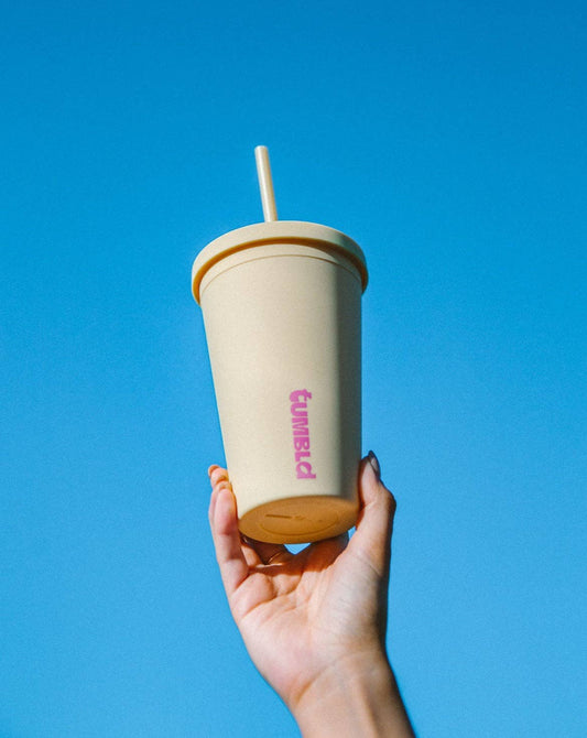 Insulated Tumbler/Coffee Cup in a sunshine yellow, offers a lid and straw and is designed to keep beverages hot or cold with a sleek, modern finish.