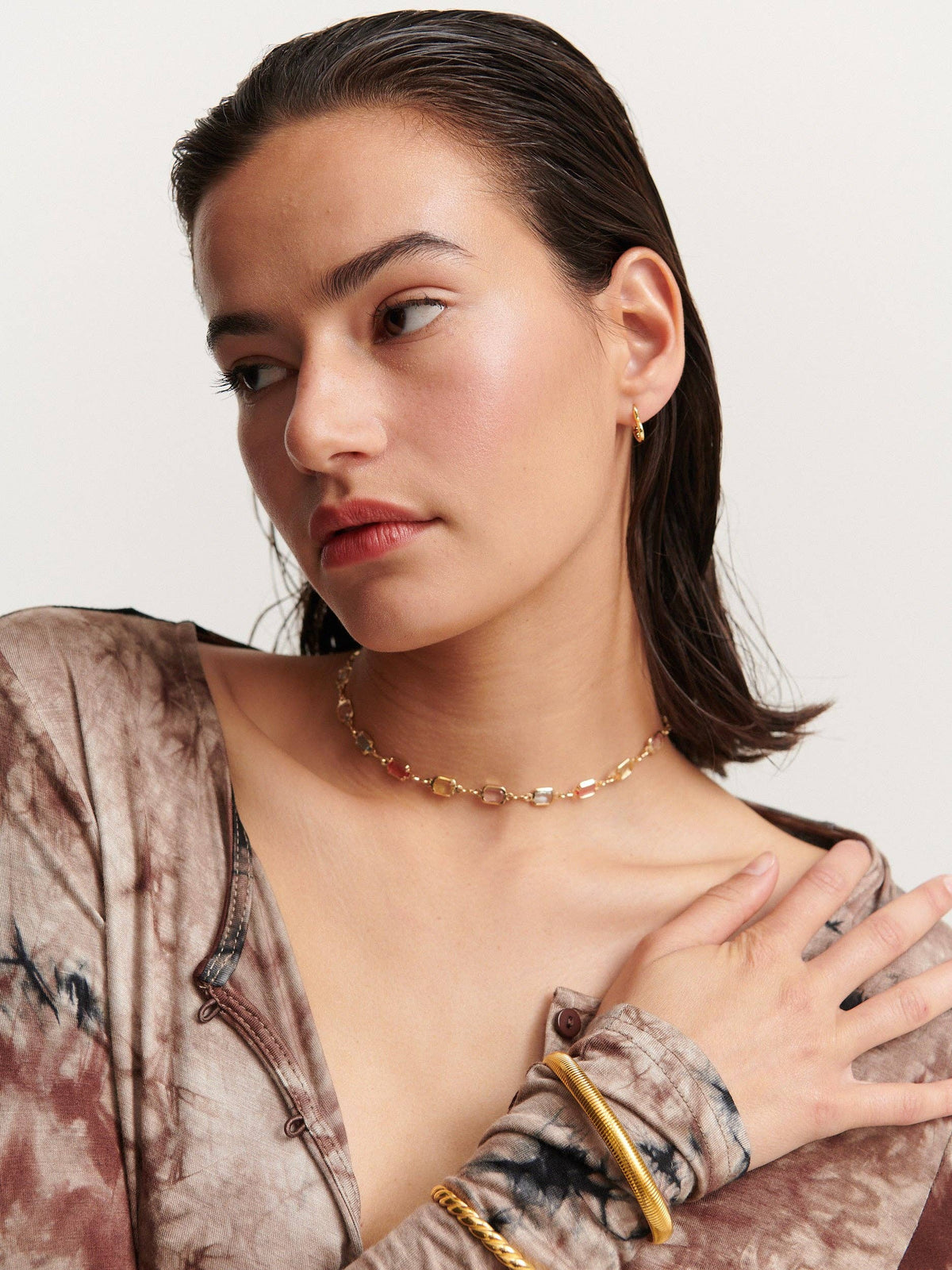 Sorrento Gem gold necklace worn by model, front view.