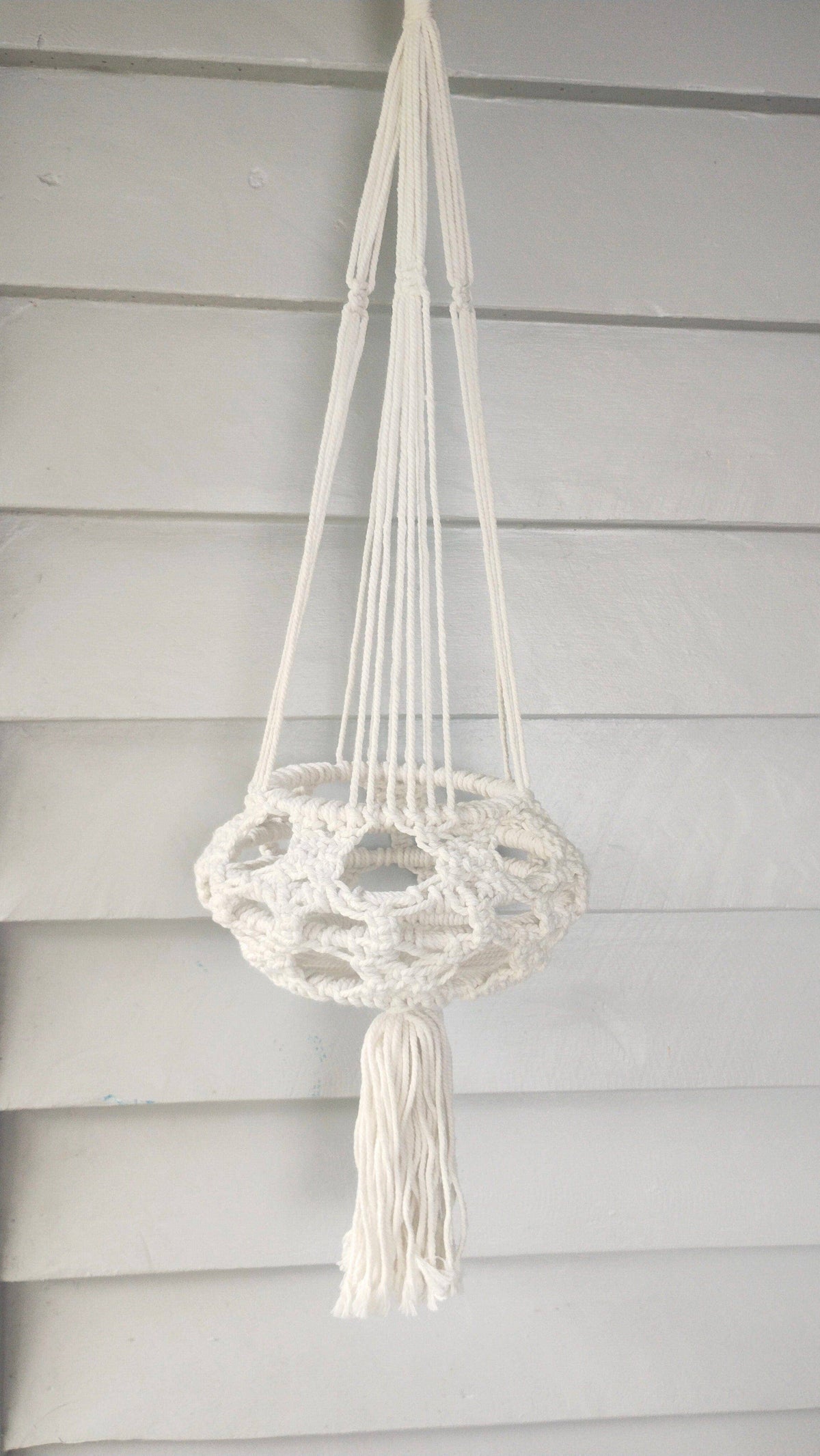 Natural macrame plant hanger detail, handmade cotton.