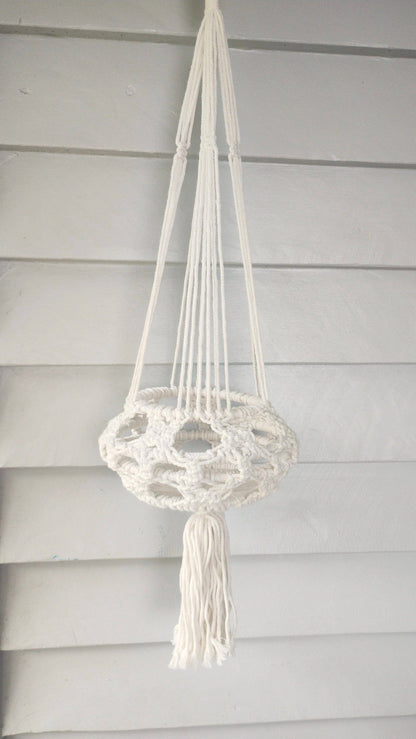 Natural macrame plant hanger detail, handmade cotton.