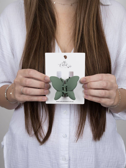 Green Butterfly Claw Clip- a feminine playful hair accessory.