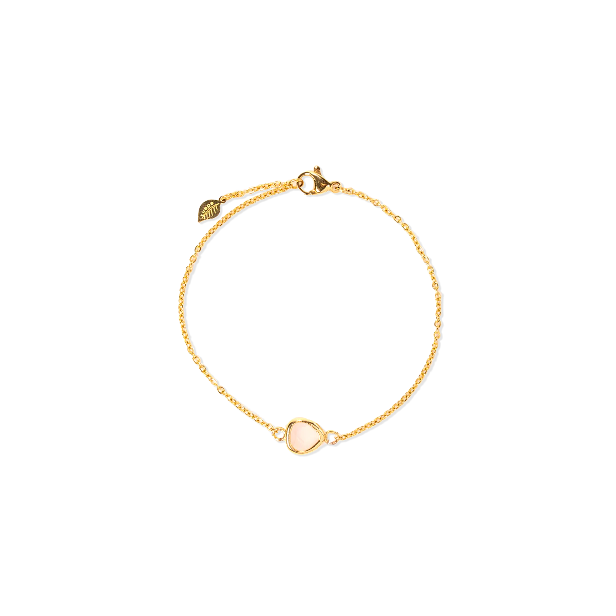 A delicate gold chain bracelet featuring a small, pale pink glass stone inlay, shown on a plain white background.