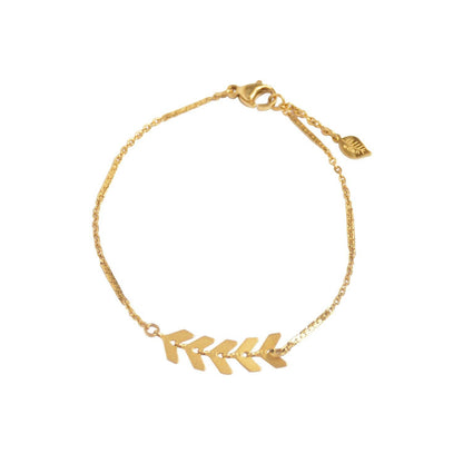 A gold-plated bracelet featuring five connected chevron-shaped pendants resembling a delicate wildflower. The chain is thin and textured, with an adjustable extension chain and a small round charm at the clasp. The bracelet is photographed against a neutral background.