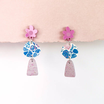 Handmade terrazzo- style earrings with pink, blue and purple design.