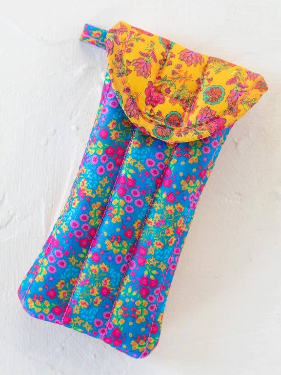 Colorful floral-patterned glasses pouch on a white background
