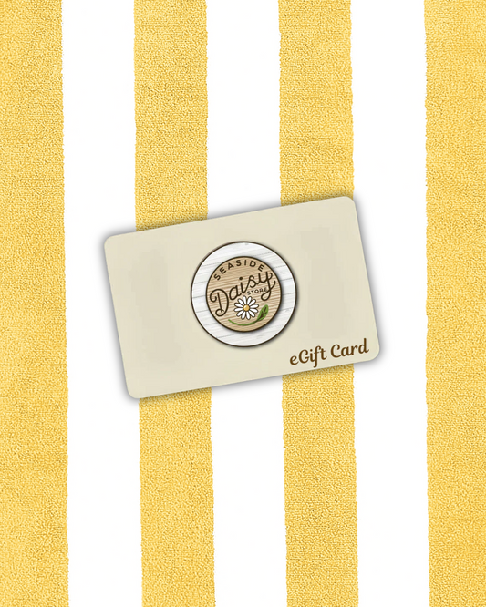 Gift card with a logo (Seaside Daisy Store eGift Card) on a yellow and white striped background beach towel.