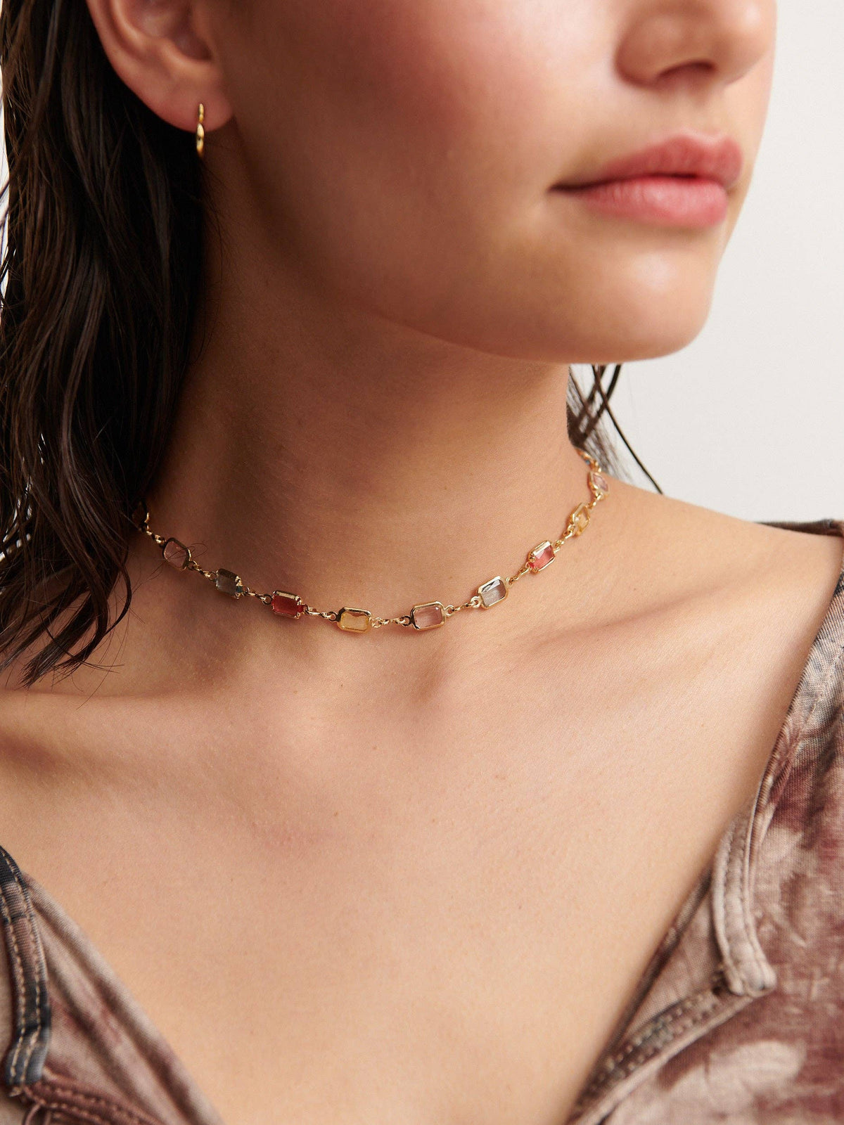 Sorrento Gem 18K gold plated necklace worn by model, close-up.