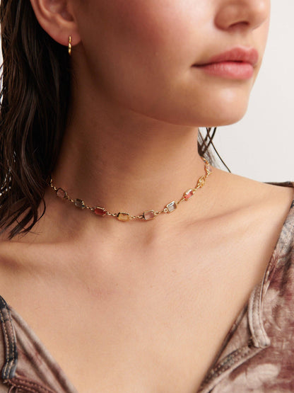 Sorrento Gem 18K gold plated necklace worn by model, close-up.
