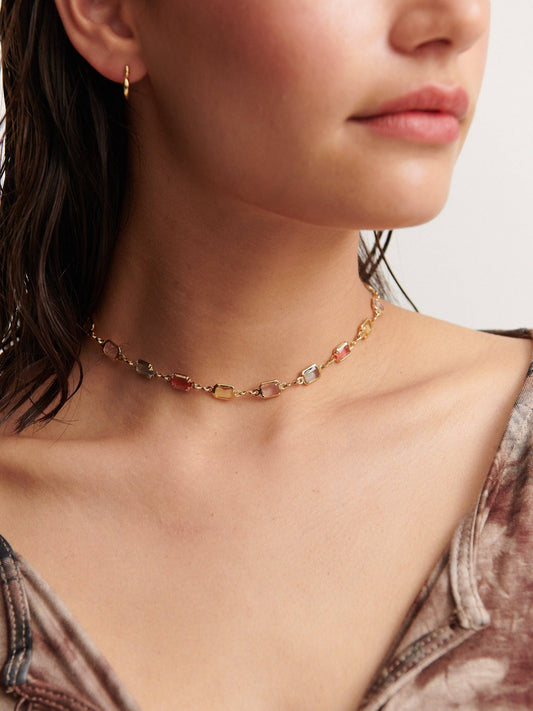 Sorrento Gem 18K gold plated necklace worn by model, close-up.