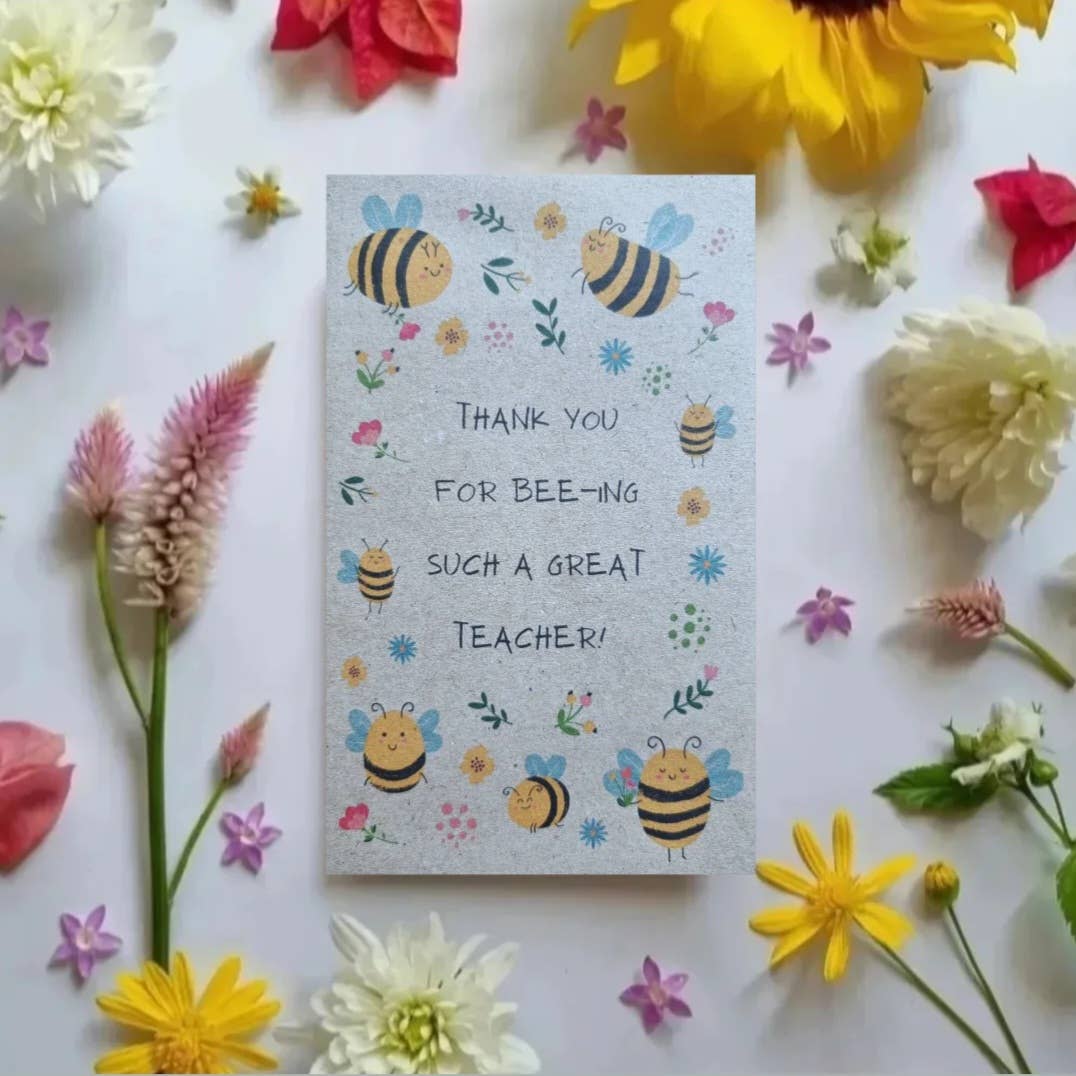 Packet of flower seeds featuring an illustration of bees and flowers, featuring a message that reads 'Thank you for bee-ing such a great teacher.'