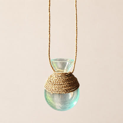 Handblown recycled glass propagation vase, side view.