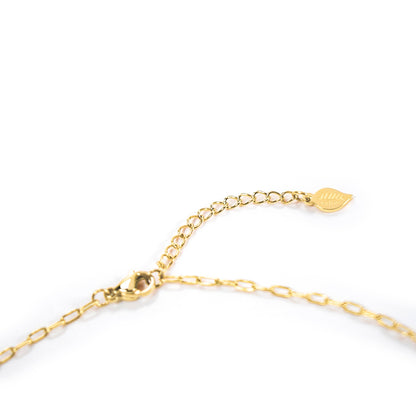 Gold bracelet on a white background